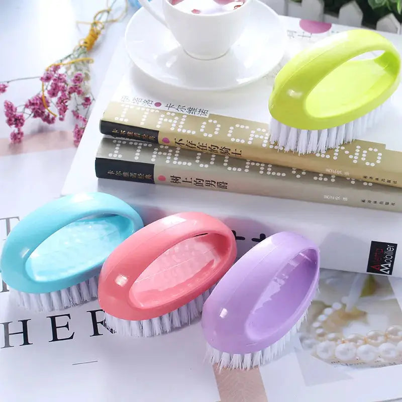 Simples Market egg-shaped cleaning brush set, 4 pcs, pastel blue, pink, lavender, and lime green with soft bristles