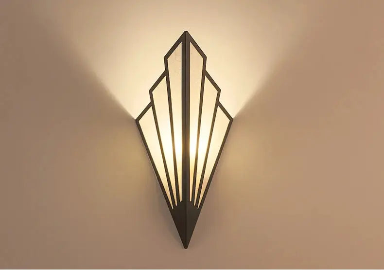 Simples Market Nordic LED iron wall lamp, black diamond-shaped geometric wall sconce with warm light.