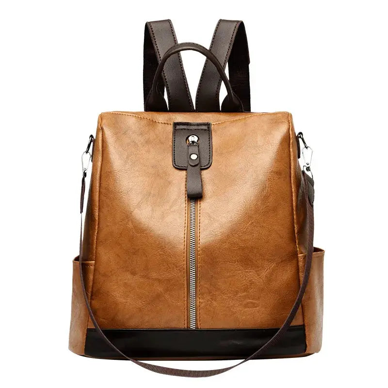 Backpack in brown PU leather anti-theft design with top handle and adjustable shoulder strap, large-capacity travel bag