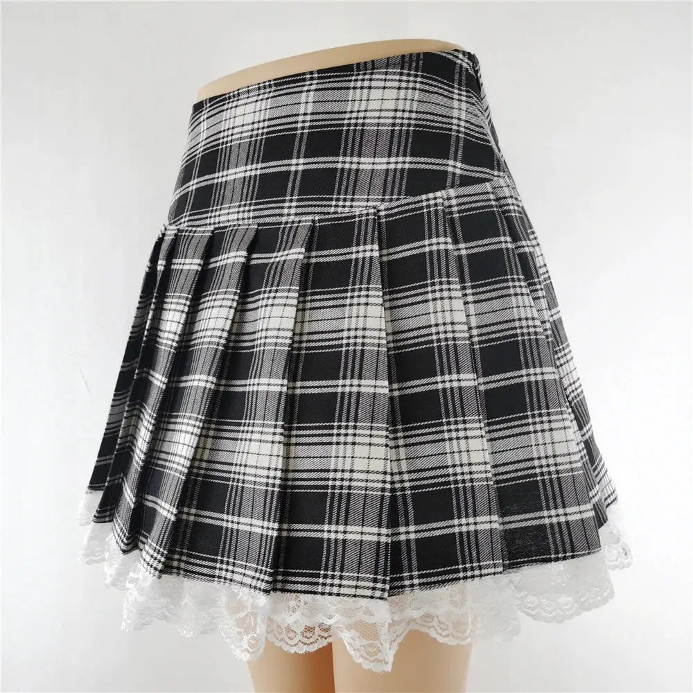 Plaid black-and-white high-waisted mini skirt with pleats and lace trim