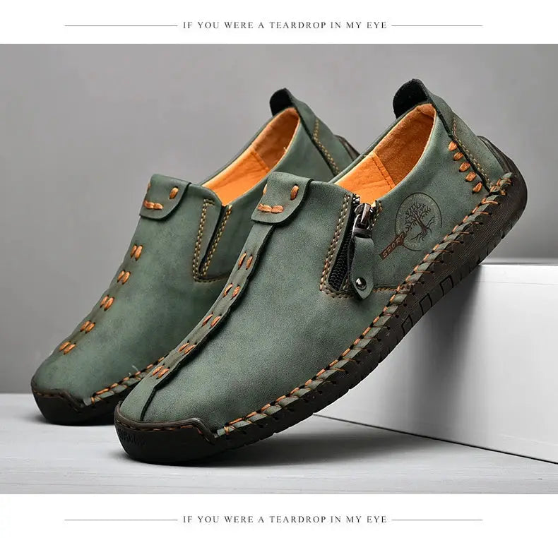 Leather men’s casual slip-on loafers by Simples Market in olive green with orange lining and brown contrast stitching.
