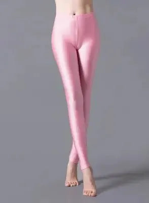 Women's pink shiny leggings, solid color stretch spandex for a form-fitting casual look and everyday wear