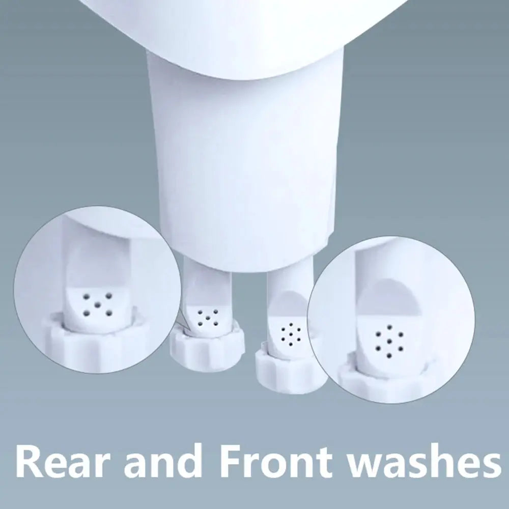Small bidet toilet seat attachment with dual nozzles, white plastic, non-electric.