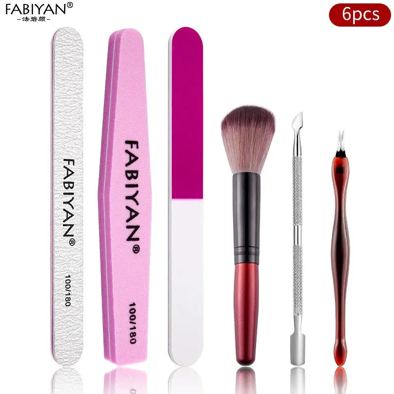 Manicure set 6pcs by FABIYAN; pink and white nail files, buffer, brush, and cuticle tools.