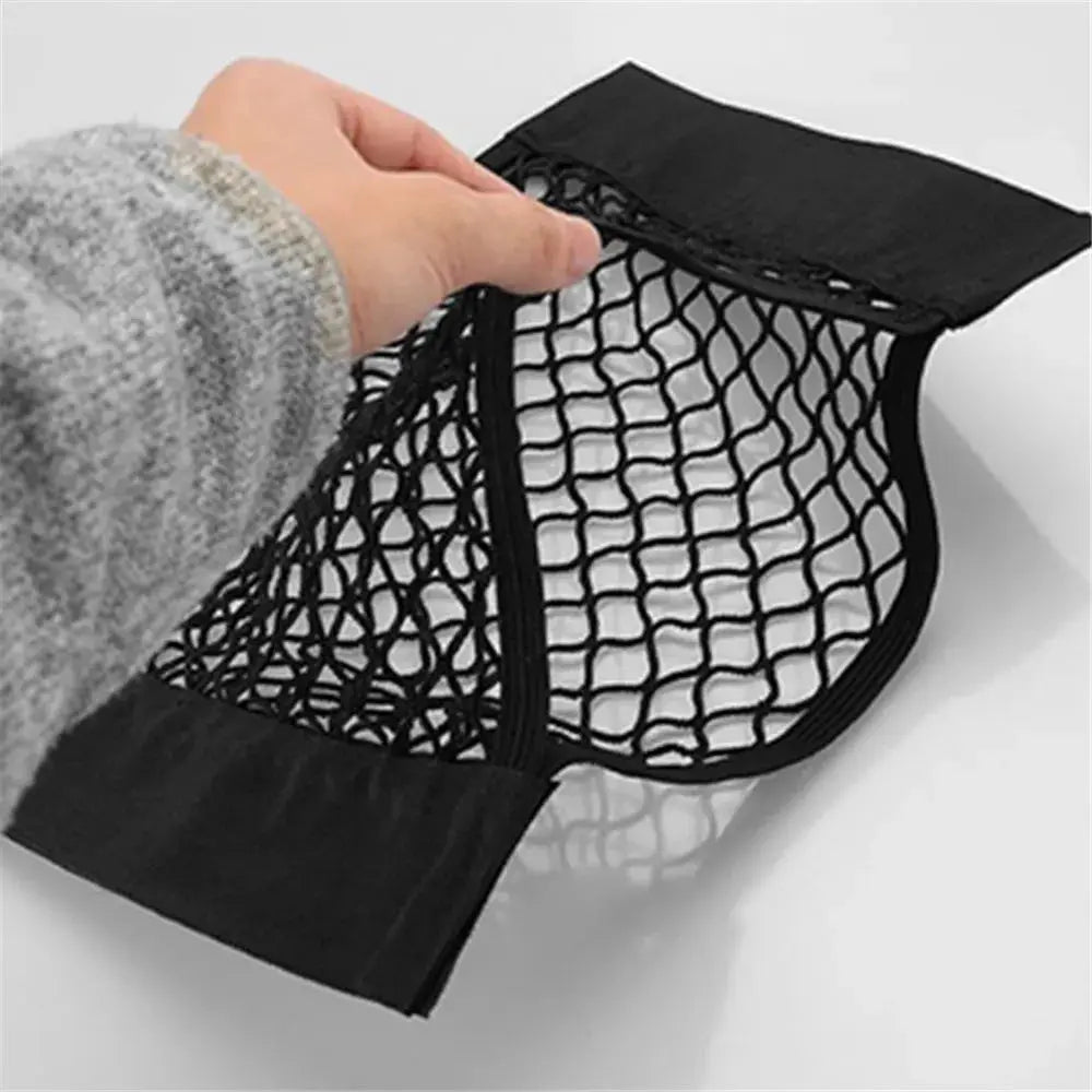 Car trunk mesh storage bag, black net with fabric ends, by Simples Market for Audi models