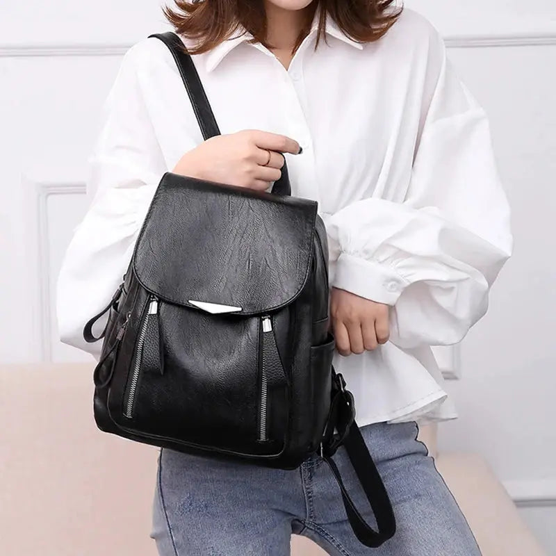 Yogodlns luxury backpack for women in black PU leather with front flap, dual-zipper pockets, large capacity