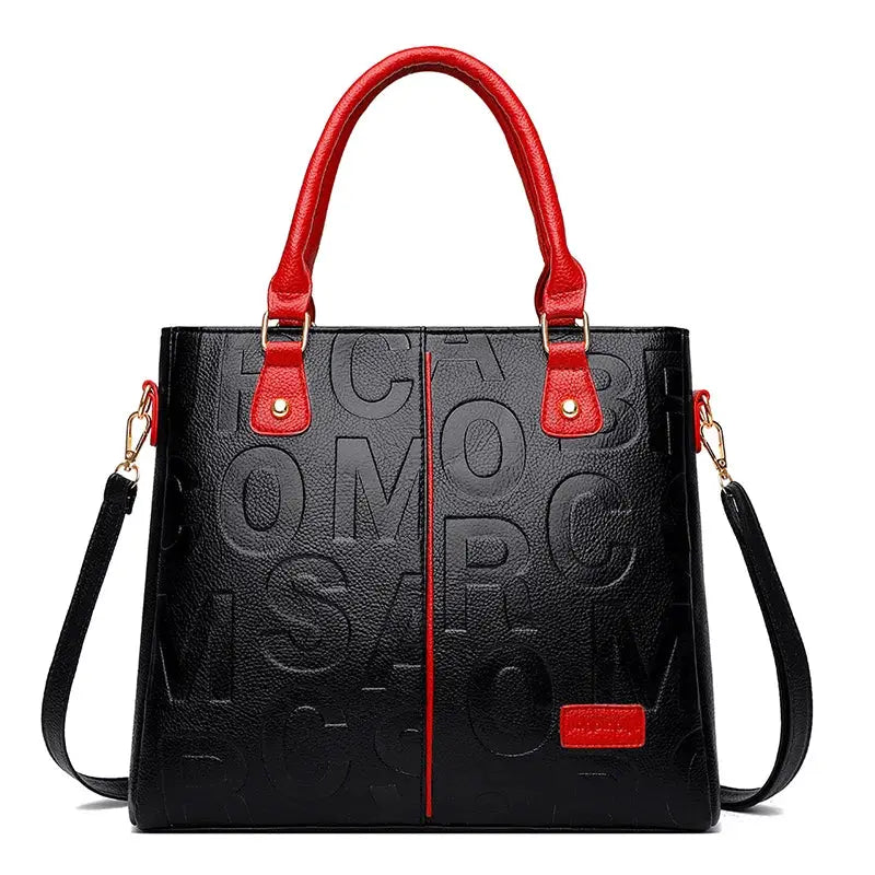 PU leather crossbody tote bag for women, black with embossed letters, red handles, detachable strap, large capacity