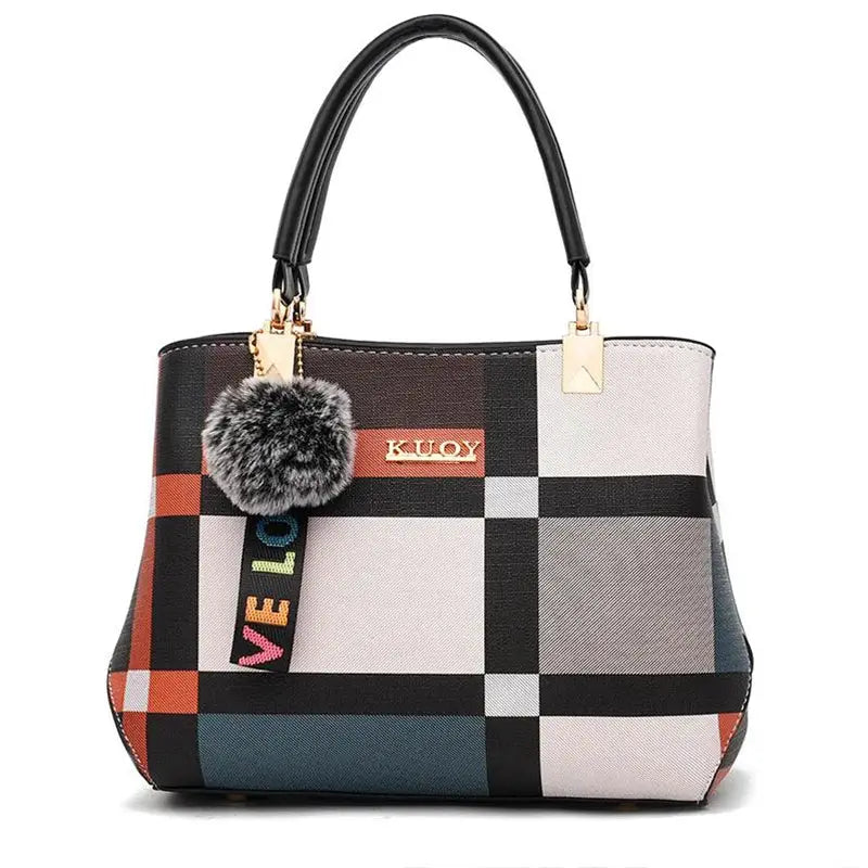 Designer handbag by Simples Market, multicolor plaid PU leather with top handles and fluffy pom-pom charm