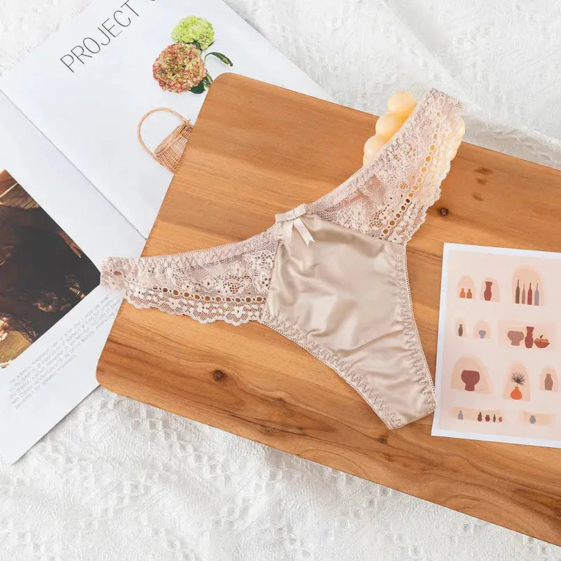 Beige satin-front lace thong with hollowed-out lace sides, low-rise seamless G-string lingerie for comfortable fit