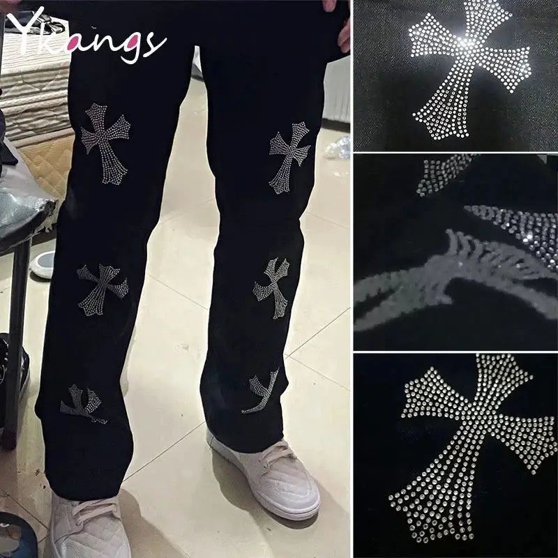 One pair of black wide-leg pants with multiple rhinestone cross motifs on the legs