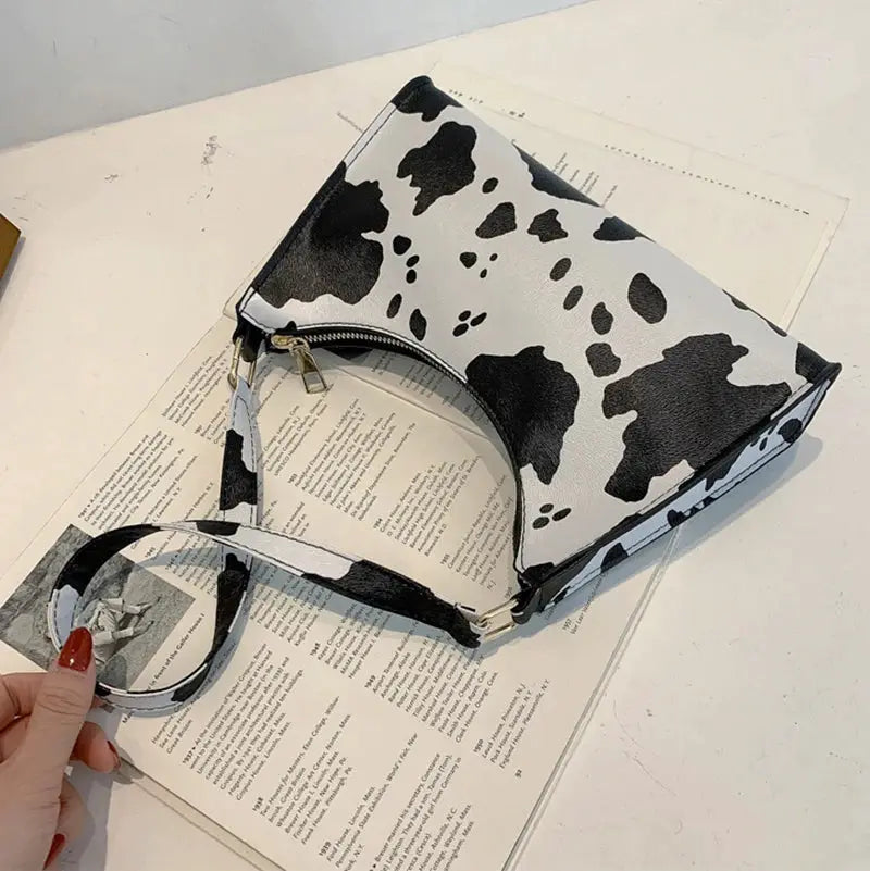 Simples Market cow-print PU leather shoulder bag with detachable round strap