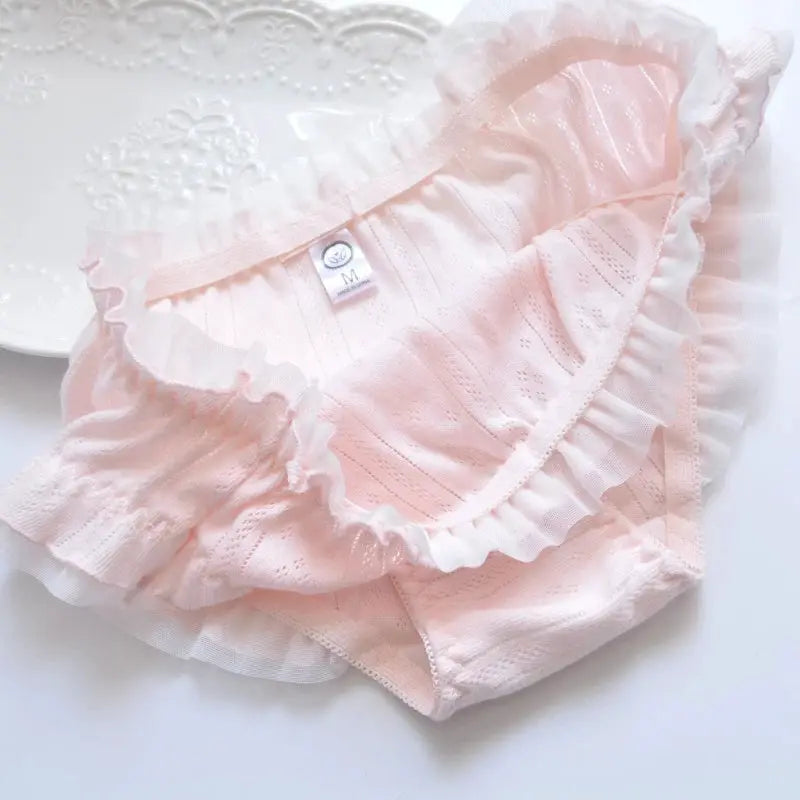 Cotton pink panties with white ruffle trim and elastic waistband, breathable comfortable fit, size M