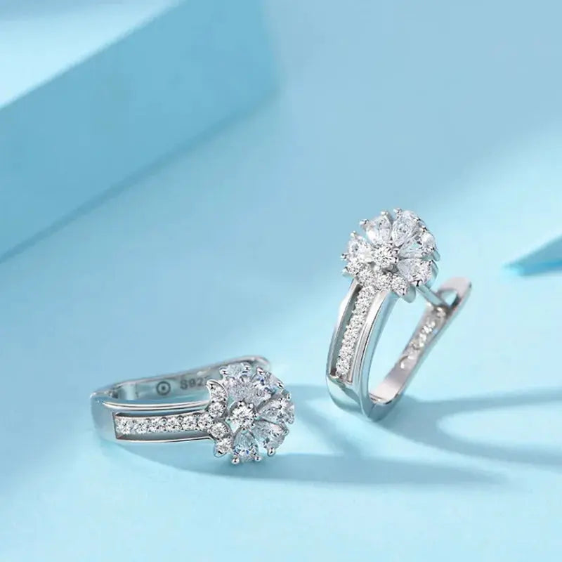 Sterling silver zircon flower hoop earrings by Simples Market, pair with clear cubic zirconia accents