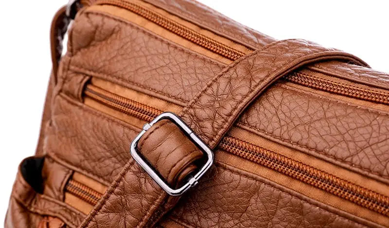 Simples Market brown PU leather women's messenger bag with buckle strap and zip pockets