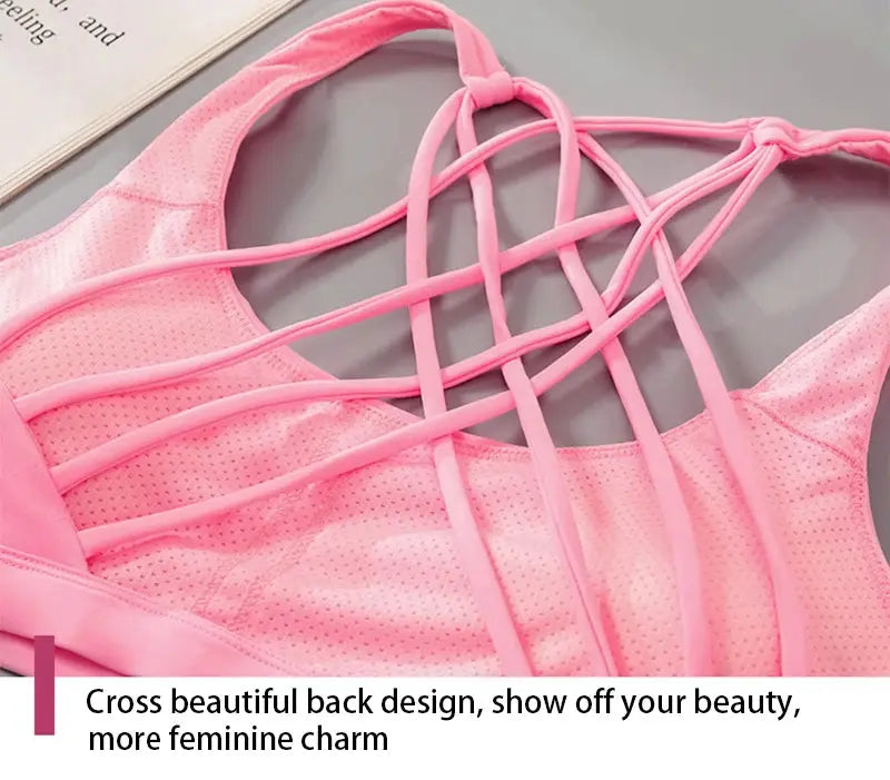 New fitness sports bra for women pink cross-back design with breathable perforated fabric by Simples Market.