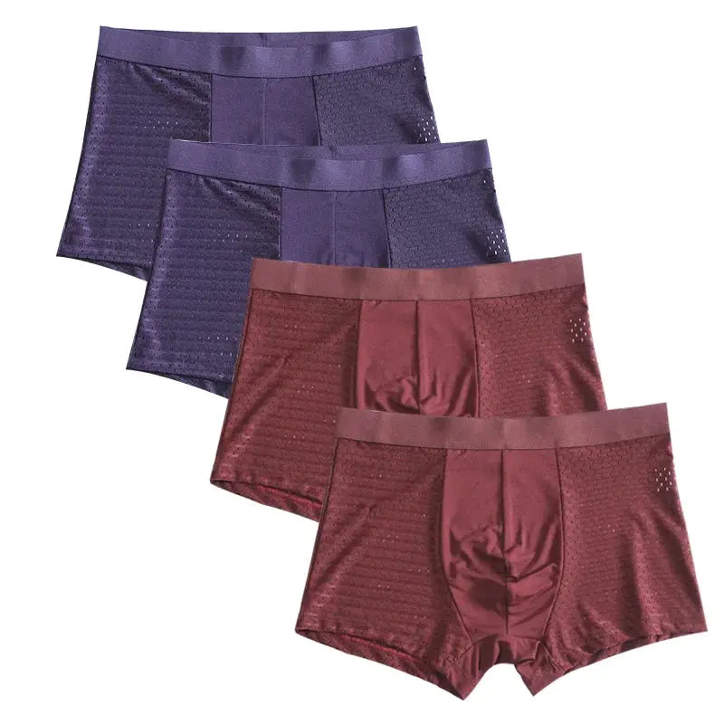 4-pack men's bamboo fiber boxer briefs in purple and burgundy with breathable panels.