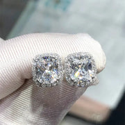 Huitan cushion-shaped cubic zirconia stud earrings, halo-set pair in silver-tone metal, Simples Market