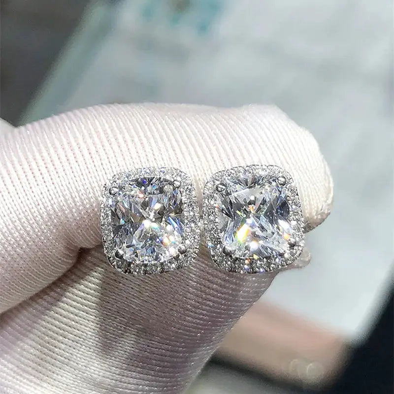 Huitan cushion-shaped cubic zirconia stud earrings, halo-set pair in silver-tone metal, Simples Market