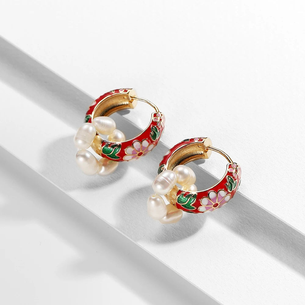 Enamel flower huggie hoop earrings by Simples Market; red floral pattern on gold hoops with pearl dangles (pair)