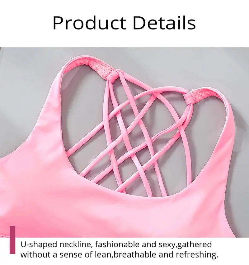 Sports bra for women in pink with crisscross back lattice straps, ideal for gym workouts