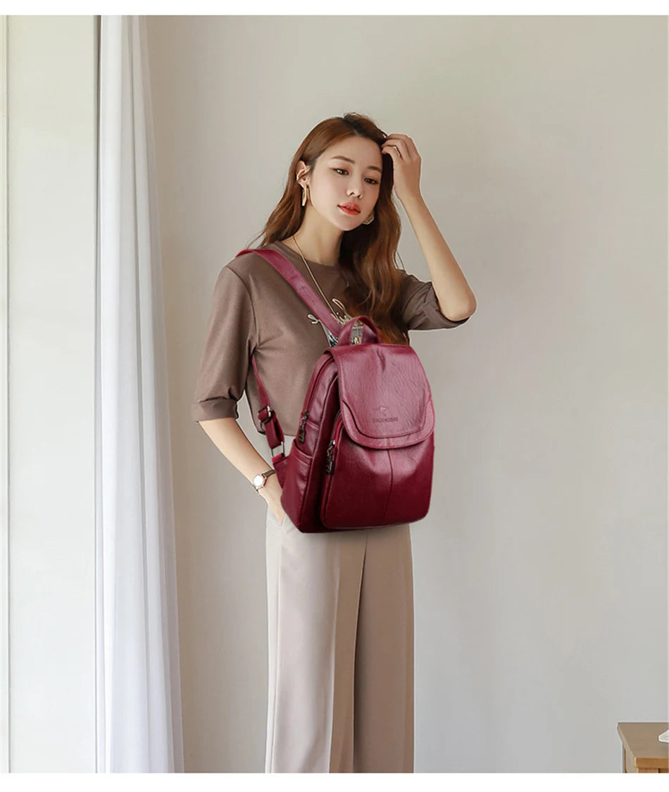 Genuine women's soft leather backpack in burgundy by Simples Market, a fashion shoulder bag