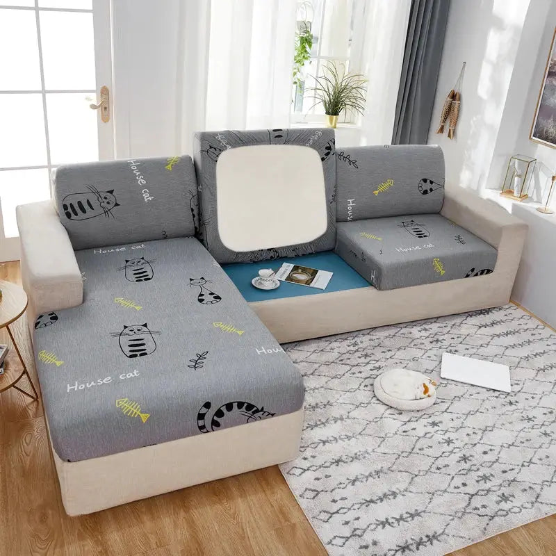 Gray geometric print sofa cover for corner sofa; elastic slipcover by Simples Market with cat pattern