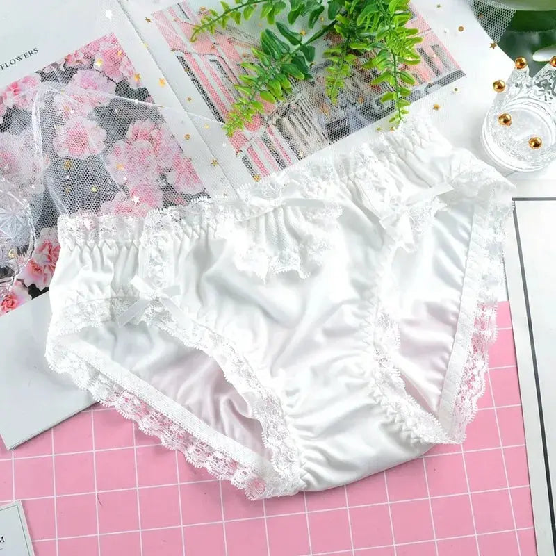 White satin lace panties with floral trim and bow, low-rise lingerie briefs