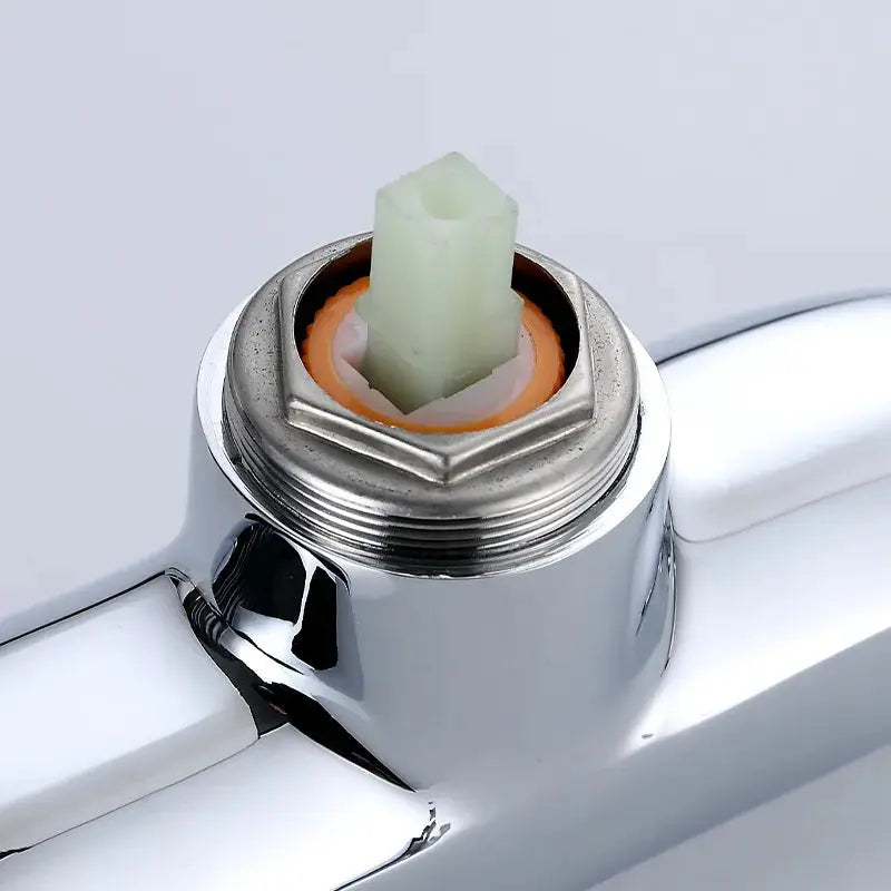 Faucet fixing cap cover for 35/40mm spools; chrome finish with orange gasket and plastic stem
