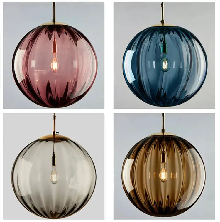 Modern LED pendant light by Simples Market with glass ball shades in pink, blue, clear and amber (set of 4)