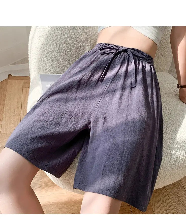 Women's cotton shorts in dark purple, high-waist, loose fit with drawstring and two pockets