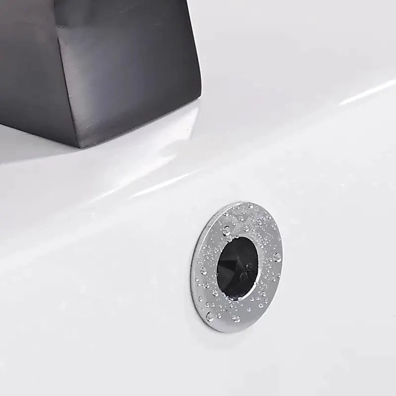 Overflow hole decorative cover, round metal insert with black center for sink basin