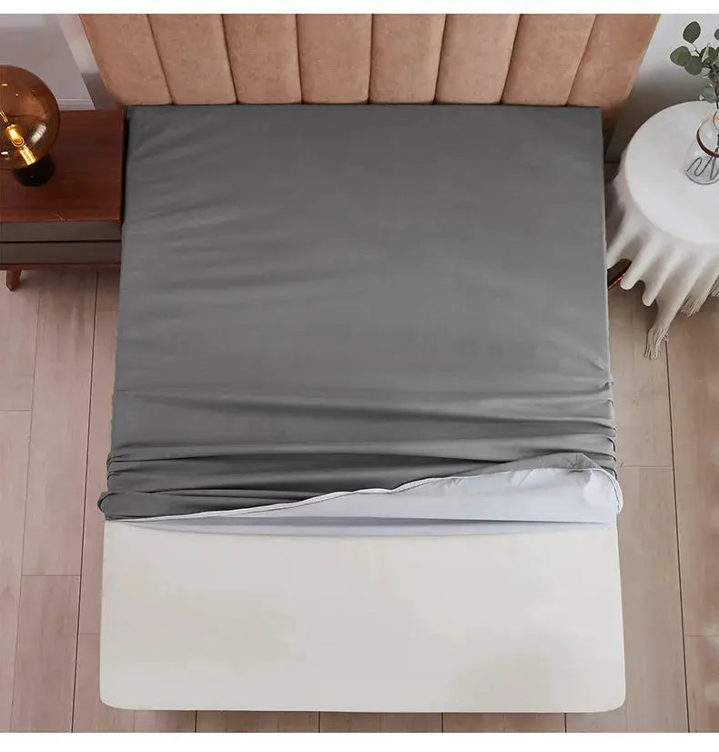 Gray 6-sided waterproof mattress cover with zipper; fully enclosed, fits twin to king bed.