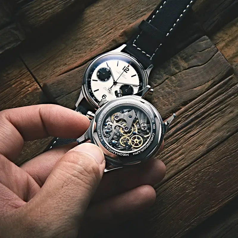 Two Sugess 1963 Panda Pilot chronograph watches with white dials, black subdials, leather straps