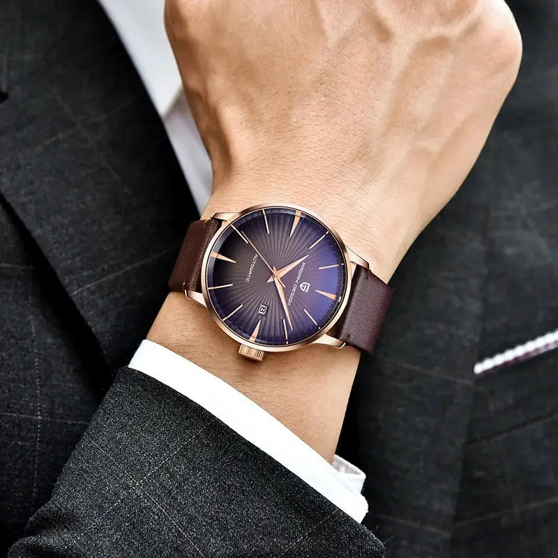 Pagani Design men's wristwatch with blue sunburst dial, rose gold case, brown leather strap.