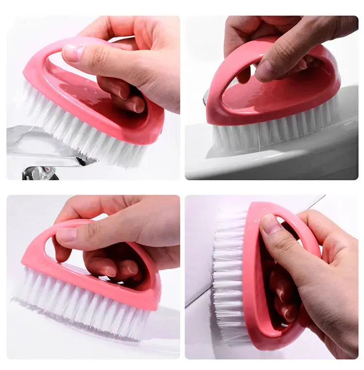 Pink egg-shaped cleaning brush with white bristles; handheld multifunctional scrub tool for bathroom and household tasks