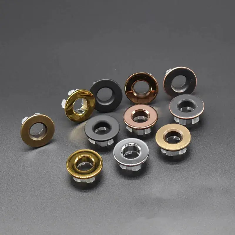 Overflow hole decorative cover rings, 12-piece mixed-metal set in copper, gold, black, and silver tones