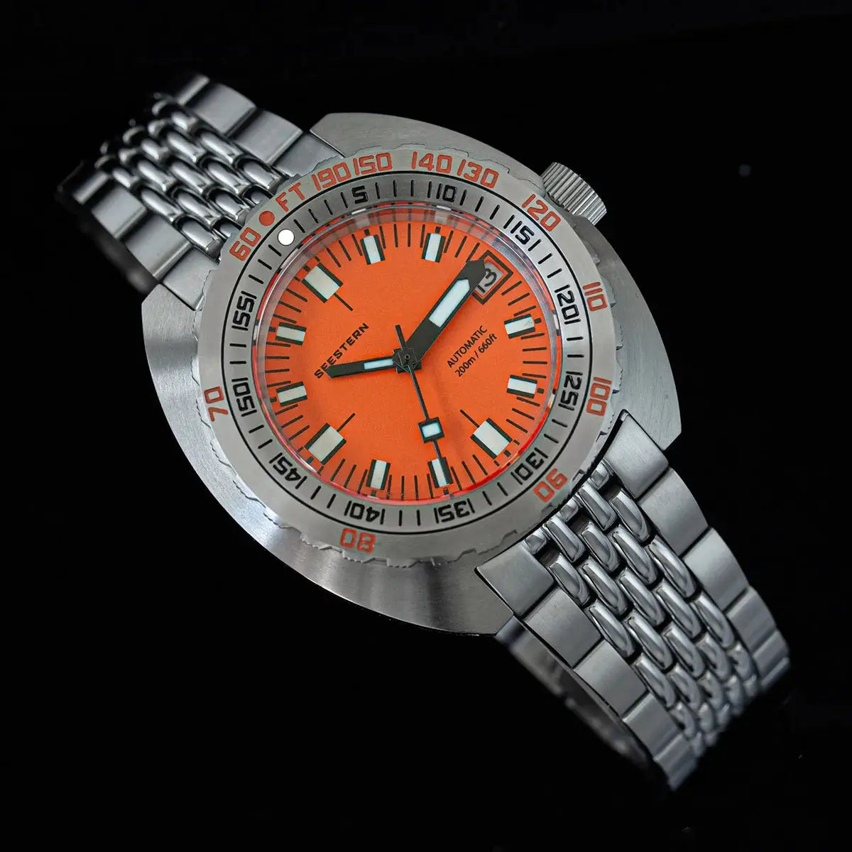 Seestern diver watch with orange dial and stainless steel bracelet