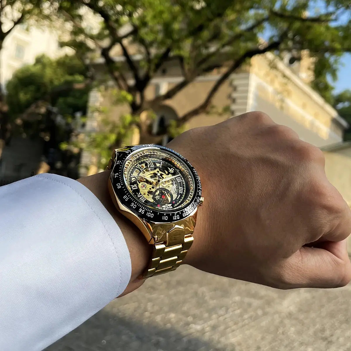 Winner mechanical sport design gold skeleton men's watch with black bezel and gold bracelet