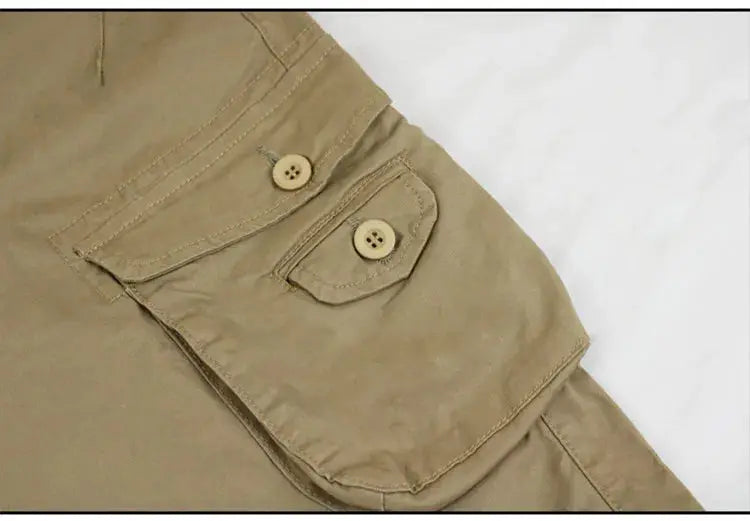 Khaki cargo pants by Simples Market with buttoned flap pockets