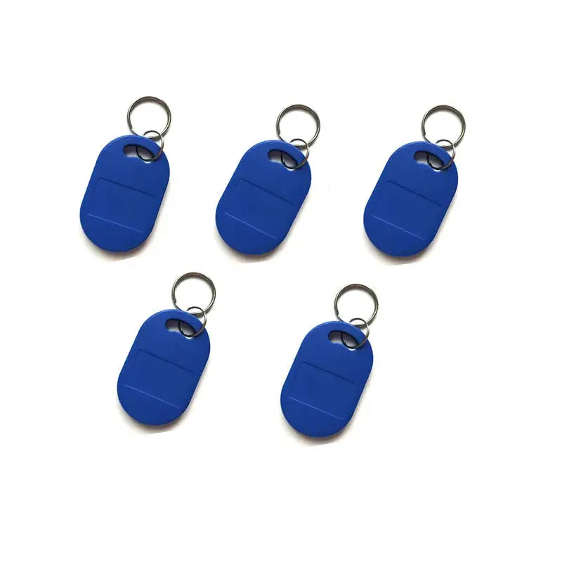 Five blue plastic RFID keyfobs with metal rings on white background