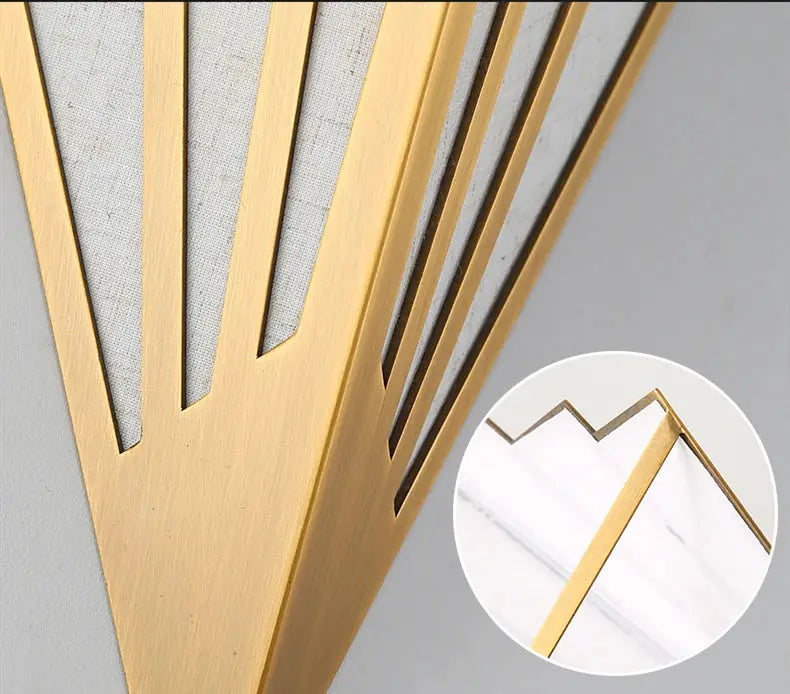 Nordic LED iron wall lamp with a gold-finish fan-style slat design, ideal for living room or bedroom decor