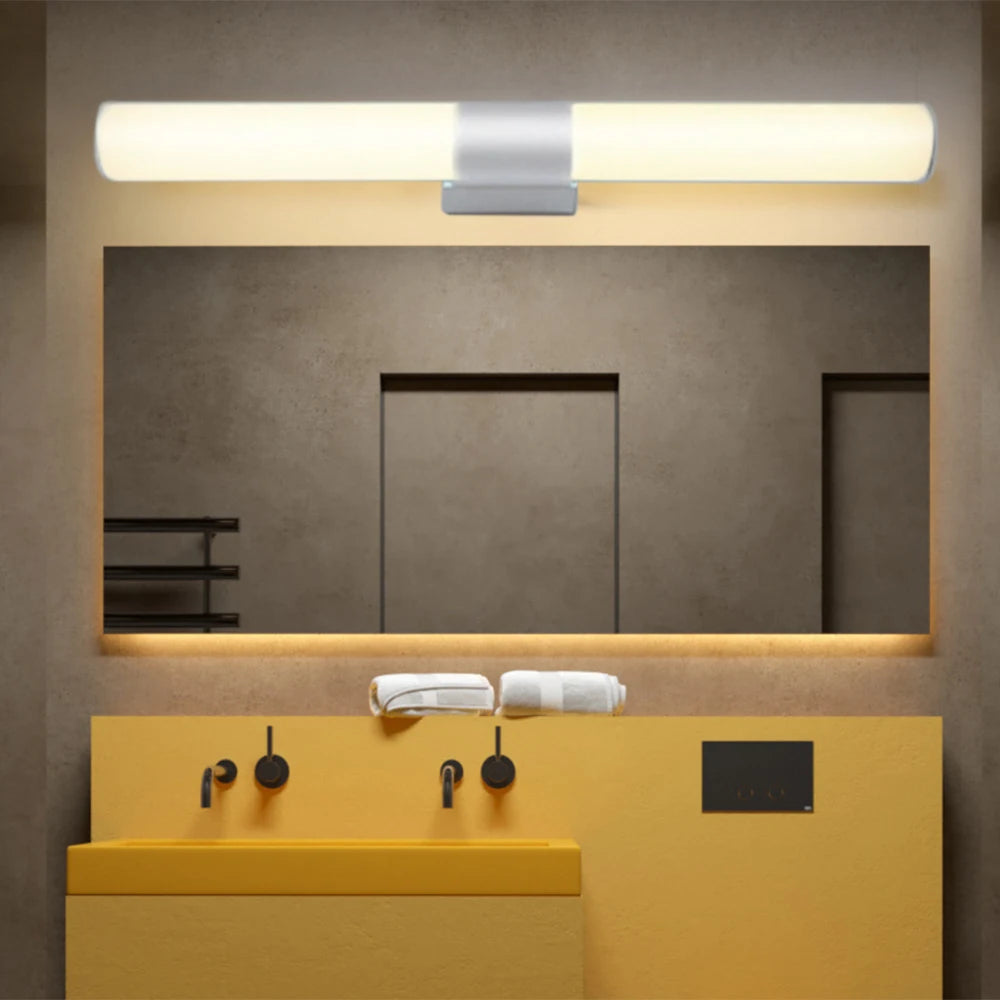 LED bathroom wall lamp, white tubular light mounted above mirror in a modern dressing area