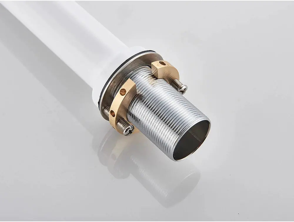 Basin faucet tailpiece with silver threaded outlet and brass clamps