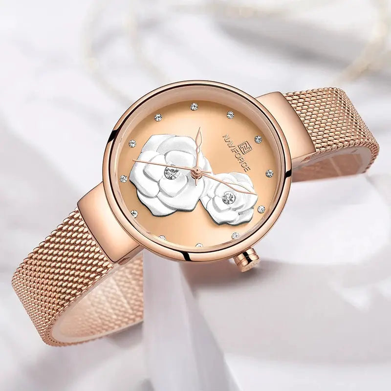 Women's NAVIFORCE watch with rose-gold steel mesh band, floral dial and crystal markers.