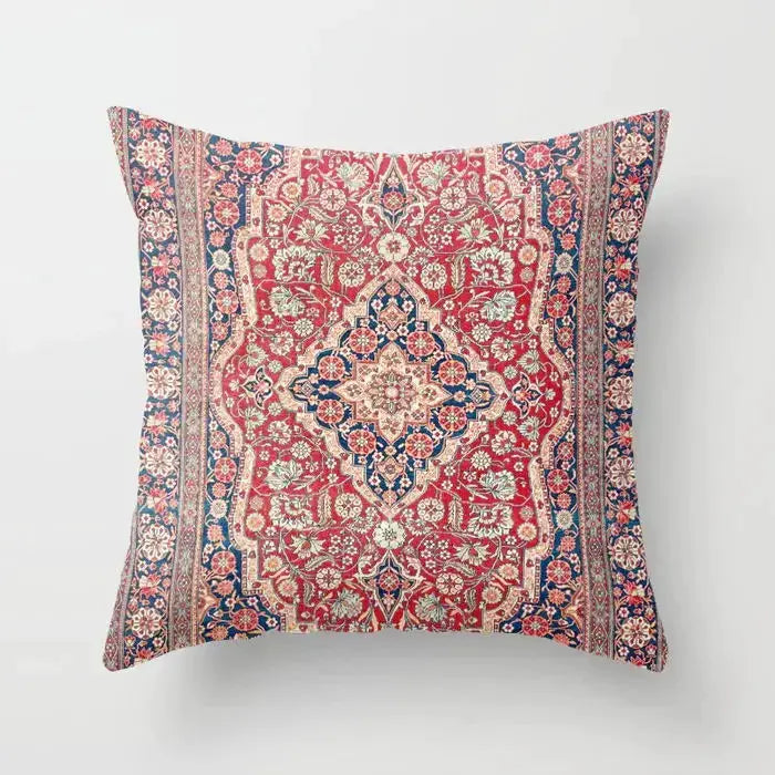 Moroccan-style decorative cushion cover with red and navy intricate motif for sofa or bed.