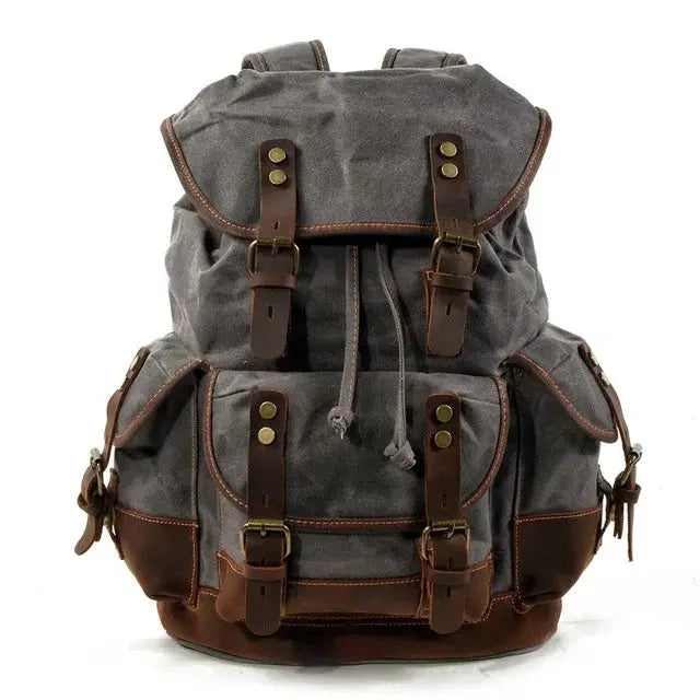 Simples Market vintage canvas backpack for men, gray waxed canvas with brown leather straps and brass hardware