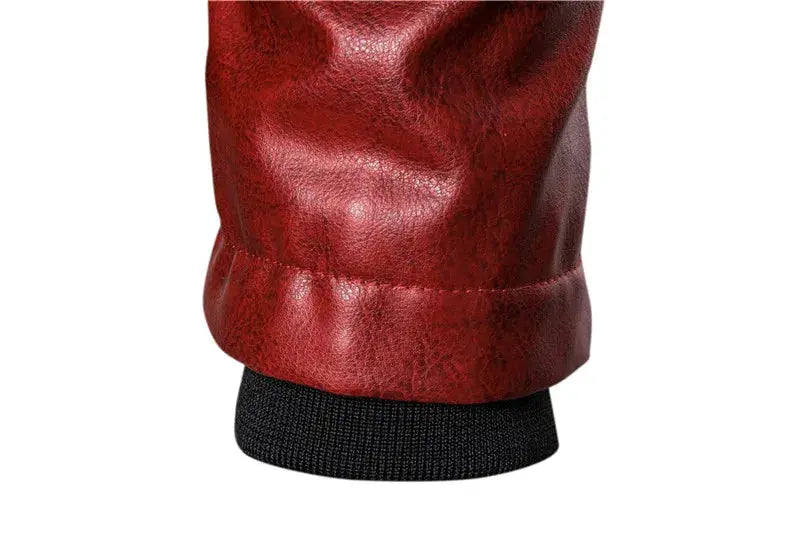 Red leather motorcycle jacket sleeve with black knit cuff