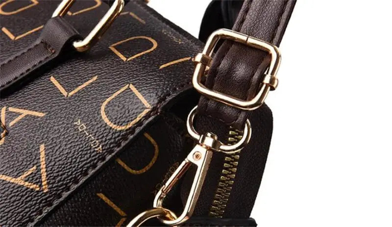 Fashion English Letter handbag in dark PU leather with gold-tone hardware and top-handle design