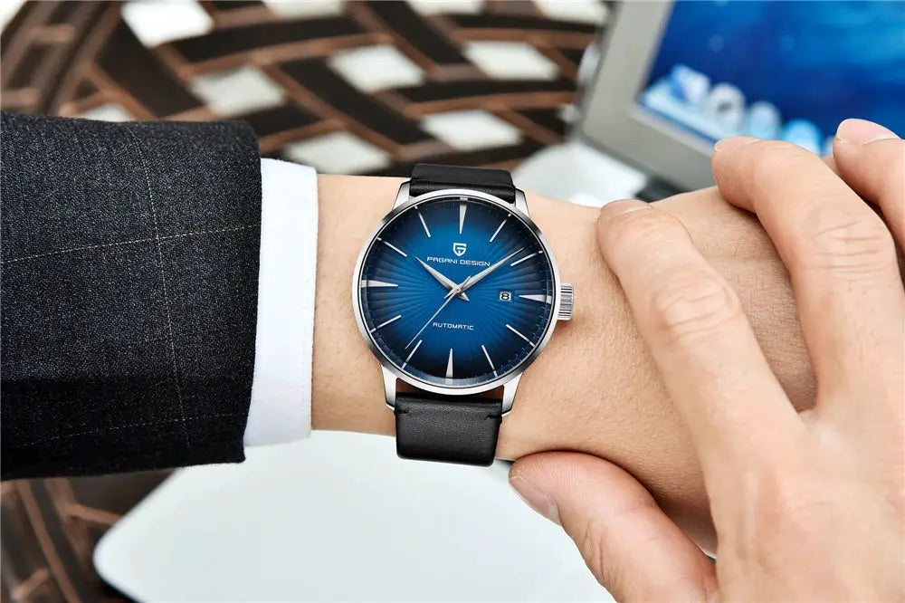 PAGANI DESIGN men's automatic watch with blue sunburst dial, stainless steel case, black leather strap.