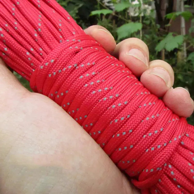 Reflective red paracord rope, 4mm 7-strand 550 parachute cord, held in hand
